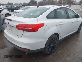 2016 Ford Focus SE z VIN 1FADP3F27GL326593, wystawiony jako IAAI lot #41024761 z przebiegiem 131 200 mil mil oraz . Historia ofert i sprzedaży dostępna na DreamBid. Obrazek 4.