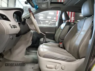 2011 Toyota Sienna XLE AAS with VIN 5TDYK3DCXBS028505, listed as a Copart auction lot 52927885 with 240,646 mi miles and Salvage Title. Bid and sale history available at DreamBid. Image 7.