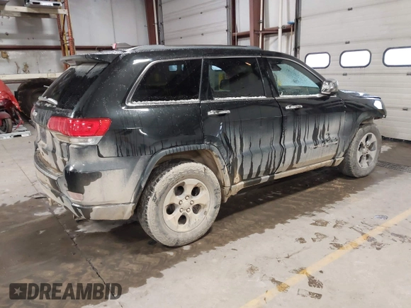 2014 Jeep Grand Cherokee Limited with VIN 1C4RJFBT1EC156536, listed as a IAAI auction lot 41053655 with 204,008 mi miles and . Bid and sale history available at DreamBid. Image 4.