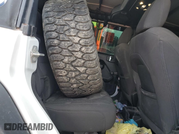 2023 Jeep Wrangler Sport с VIN 1C4HJXDGXPW596127, выставлен на аукционе Copart как лот 56645205 с пробегом 64 257 миль миль и Списание • Salvage title. История ставок и продаж доступна на DreamBid. Изображение 10.