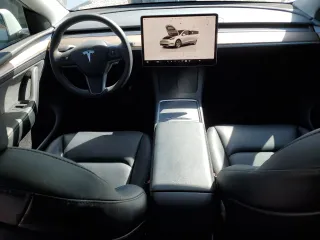 2023 Tesla Model Y Long Range z VIN 7SAYGDEE7PF788932, wystawiony jako Copart lot #52822515 z przebiegiem 33 007 mil mil oraz Szkoda całkowita • Salvage title. Historia ofert i sprzedaży dostępna na DreamBid. Obrazek 8.