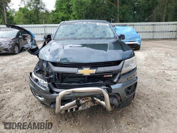 2015 Chevrolet Colorado 2WD Z71 with VIN 1GCGSCE30F1146978, listed as a Copart auction lot 56800985 with 201,186 mi miles and Salvage title. Bid and sale history available at DreamBid. Image 5.