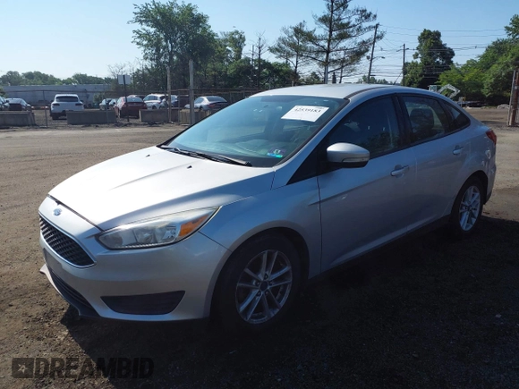 2015 Ford Focus SE with VIN 1FADP3F24FL301732, listed as a IAAI auction lot 42539183 with 127,045 mi miles and . Bid and sale history available at DreamBid. Image 2.