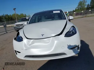 2023 Tesla Model Y Performance with VIN 7SAYGDEF2PF754938, listed as a IAAI auction lot 42067041 with 21,103 mi miles and . Bid and sale history available at DreamBid. Image 12.