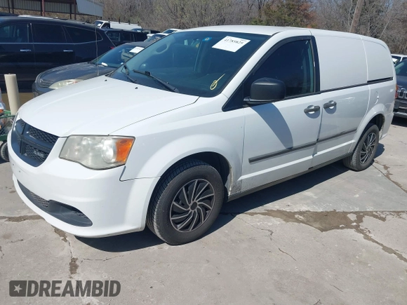 2014 Ram Cargo Van with VIN 2C4RRGAG9ER174194, listed as a IAAI auction lot 41785825 with 174,786 mi miles and . Bid and sale history available at DreamBid. Image 2.