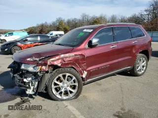 2019 Jeep Grand Cherokee Summit with VIN 1C4RJFJT3KC595525, listed as a Copart auction lot 77857234 with 67,104 mi miles and Salvage Title. Bid and sale history available at carsss.com. Image 1.