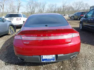 2015 Lincoln MKZ z VIN 3LN6L2G94FR619447, wystawiony jako IAAI lot #41831679 z przebiegiem 97 906 mil mil oraz . Historia ofert i sprzedaży dostępna na DreamBid. Obrazek 16.
