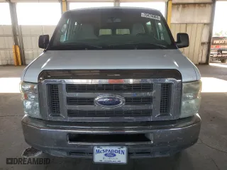 2013 Ford Econoline Wagon XL with VIN 1FBSS3BL0DDA77076, listed as a Copart auction lot 70474004 with 154,679 mi miles and Salvage Title. Bid and sale history available at carsss.com. Image 5.