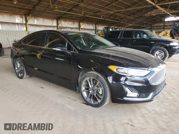 2020 Ford Fusion Titanium with VIN 3FA6P0RU7LR100411, listed as a Copart auction lot 56215615 with 108,457 mi miles and Salvage title. Bid and sale history available at DreamBid. Image 4.