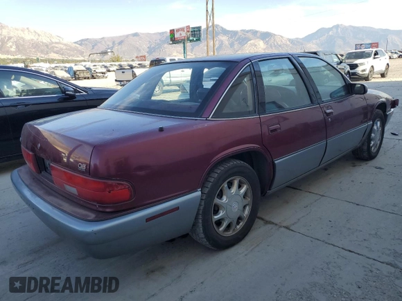 1996 Buick Regal with VIN 2G4WF52K3T1461797, listed as a Copart auction lot 74704534 with 93,303 mi miles and Salvage Title. Bid and sale history available at DreamBid. Image 3.