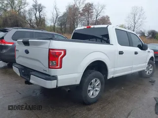 2015 Ford F-150 XLT with VIN 1FTEW1E80FFB30827, listed as a IAAI auction lot 41961072 with 155,206 mi miles and . Bid and sale history available at DreamBid. Image 4.