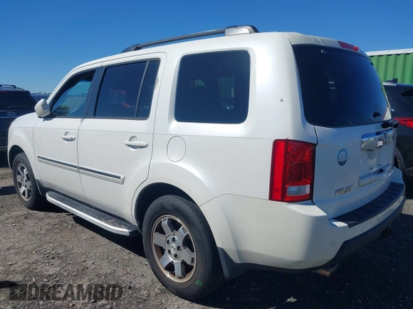 2011 Honda Pilot Touring with VIN 5FNYF4H97BB067954, listed as a IAAI auction lot 41832617 with 141,141 mi miles. Bid and sale history available at carsss.com. Image 3.