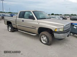 2002 Dodge 2500 z VIN 3B7KF23602M293174, wystawiony jako Copart lot #58604145 z przebiegiem 409 244 mil mil oraz Tytuł czysty. Historia ofert i sprzedaży dostępna na DreamBid. Obrazek 4.