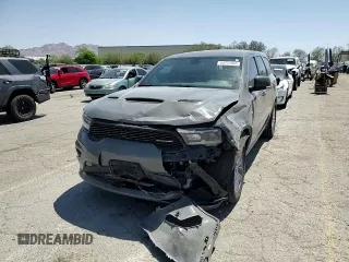 2022 Dodge Durango R/T z VIN 1C4SDJCT1NC136202, wystawiony jako Copart lot #54771065 z przebiegiem 54 039 mil mil oraz Szkoda całkowita • Salvage title. Historia ofert i sprzedaży dostępna na DreamBid. Obrazek 14.