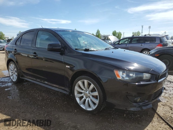 2009 Mitsubishi Lancer z VIN JA3AX88W99U613116, wystawiony jako Copart lot #58765855 z przebiegiem 256 289 mil mil oraz Czysty tytuł • Clean title. Historia ofert i sprzedaży dostępna na DreamBid. Obrazek 4.