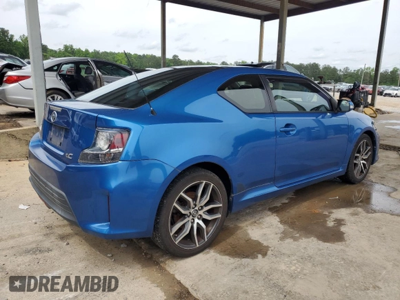 2014 Scion tC z VIN JTKJF5C76E3087992, wystawiony jako Copart lot #56058445 z przebiegiem 84 387 mil mil oraz Czysty tytuł • Clean title. Historia ofert i sprzedaży dostępna na DreamBid. Obrazek 3.