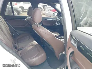 2018 BMW X1 xDrive28i with VIN WBXHT3C35J5K24695, listed as a IAAI auction lot 40932205 with 66,354 mi miles. Bid and sale history available at carsss.com. Image 8.