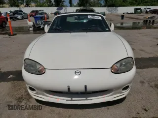 2000 Mazda MX-5 Miata with VIN JM1NB3531Y0152594, listed as a Copart auction lot 57460195 with 78,139 mi miles and Salvage title. Bid and sale history available at DreamBid. Image 5.