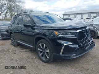 2023 Honda Pilot Elite with VIN 5FNYG1H80PB029511, listed as a IAAI auction lot 41976826 with 37,246 mi miles and . Bid and sale history available at DreamBid. Image 1.
