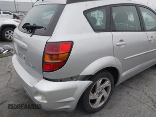 2003 Pontiac Vibe with VIN 5Y2SL62833Z438839, listed as a IAAI auction lot 41977690 with 234,670 mi miles. Bid and sale history available at carsss.com. Image 13.