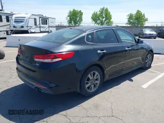 2016 Kia Optima LX Turbo with VIN 5XXGT4L12GG077169, listed as a IAAI auction lot 42108788 with 116,589 mi miles. Bid and sale history available at carsss.com. Image 4.
