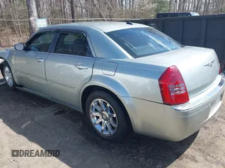 2006 Chrysler 300 C with VIN 2C3LA63H06H105774, listed as a IAAI auction lot 41918634 with 319,232 mi miles. Bid and sale history available at carsss.com. Image 3.
