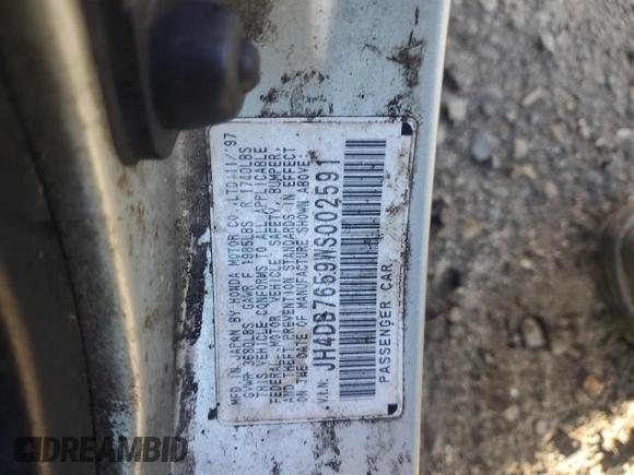 1998 Acura Integra LS with VIN JH4DB7659WS002591, listed as a Copart auction lot 84289584 with 316,458 mi miles and Salvage title. Bid and sale history available at DreamBid. Image 13.