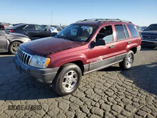 2001 Jeep Grand Cherokee Laredo z VIN 1J4GX48N31C643681, wystawiony jako Copart lot #79871064 z przebiegiem 102 945 mil mil oraz Szkoda całkowita • Salvage title. Historia ofert i sprzedaży dostępna na DreamBid. Obrazek 1.