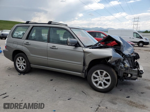 2006 Subaru Forester X with VIN JF1SG65656H709849, listed as a Copart auction lot 59811325 with 198,659 mi miles and Salvage title. Bid and sale history available at DreamBid. Image 4.