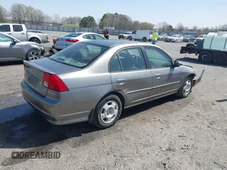 2004 Honda Civic with VIN JHMES96674S020013, listed as a IAAI auction lot 41827411 with 118,601 mi miles. Bid and sale history available at carsss.com. Image 4.
