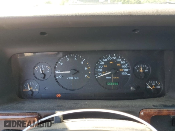 1998 Jeep Grand Cherokee Laredo z VIN 1J4GZ58S4WC278490, wystawiony jako Copart lot #62388535 z przebiegiem 133 896 mil mil oraz Czysty tytuł • Clean title. Historia ofert i sprzedaży dostępna na DreamBid. Obrazek 9.