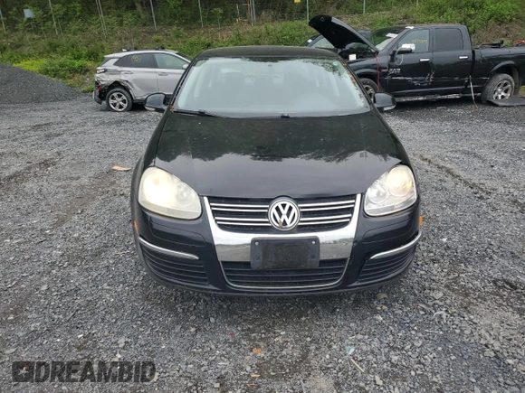 2009 Volkswagen Jetta S z VIN 3VWJZ71K09M010117, wystawiony jako Copart lot #56309165 z przebiegiem 181 692 mil mil oraz Szkoda całkowita • Salvage title. Historia ofert i sprzedaży dostępna na DreamBid. Obrazek 5.