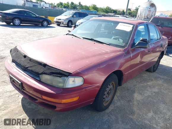 1992 Toyota Camry LE z VIN JT2SK12E5N0024814, wystawiony jako IAAI lot #42386859 z przebiegiem 235 476 mil mil oraz . Historia ofert i sprzedaży dostępna na DreamBid. Obrazek 2.