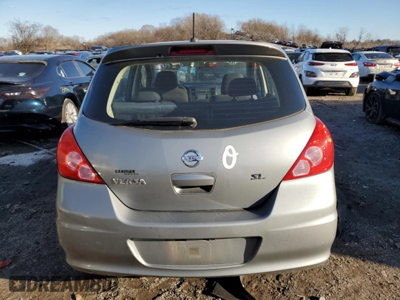 2010 Nissan Versa 1.8 SL with VIN 3N1BC1CPXAL431404, listed as a Copart auction lot 43817575 with 28,599 mi miles and Salvage Title. Bid and sale history available at carsss.com. Image 6.