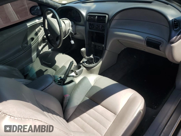 1999 Ford Mustang with VIN 1FAFP4448XF233101, listed as a Copart auction lot 54701005 with 54,585 mi miles and Salvage title. Bid and sale history available at DreamBid. Image 8.