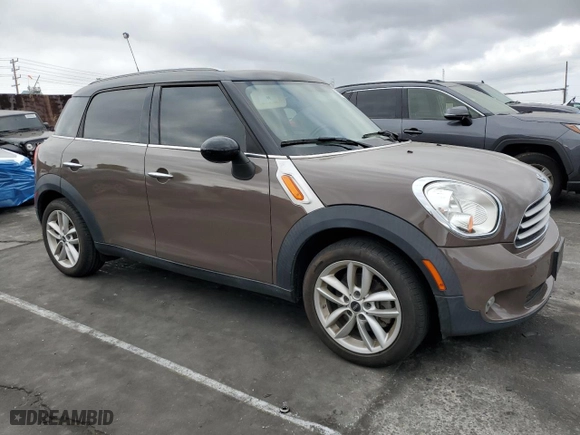 2013 MINI Cooper Countryman with VIN WMWZB3C54DWM09404, listed as a Copart auction lot 54568195 with 126,772 mi miles and Clean Title. Bid and sale history available at carsss.com. Image 4.