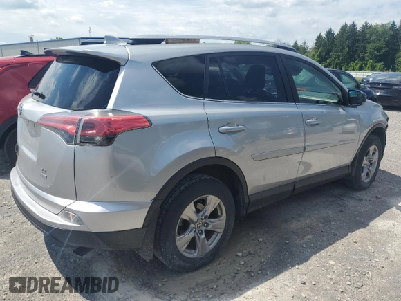 2018 Toyota RAV4 LE with VIN JTMBFREV3JJ236153, listed as a Copart auction lot 62642325 with 70,261 mi miles and Salvage title. Bid and sale history available at DreamBid. Image 3.