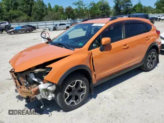 2015 Subaru Crosstrek Premium with VIN JF2GPACC4F8277252, listed as a Copart auction lot 61463265 with 102,712 mi miles and Salvage title. Bid and sale history available at DreamBid. Image 1.