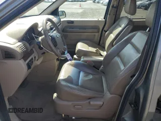 2004 Ford Freestar SEL z VIN 2FMDA522X4BA41942, wystawiony jako Copart lot #54007555 z przebiegiem 119 877 mil mil oraz Szkoda całkowita • Salvage title. Historia ofert i sprzedaży dostępna na DreamBid. Obrazek 7.