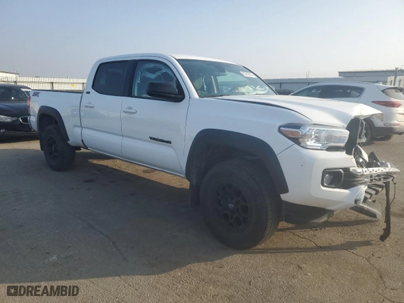 2023 Toyota Tacoma 2WD SR5 with VIN 3TMBZ5DN0PM039406, listed as a Copart auction lot 83616014 with 33,846 mi miles and Salvage Title. Bid and sale history available at carsss.com. Image 4.