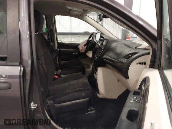 2019 Dodge Grand Caravan SE with VIN 2C4RDGBG9KR527770, listed as a IAAI auction lot 41571473 with 101,310 mi miles and . Bid and sale history available at DreamBid. Image 5.