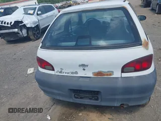1998 Chevrolet Metro with VIN 2C1MR2262W6706873, listed as a IAAI auction lot 42052809 with 142,302 mi miles and . Bid and sale history available at DreamBid. Image 6.