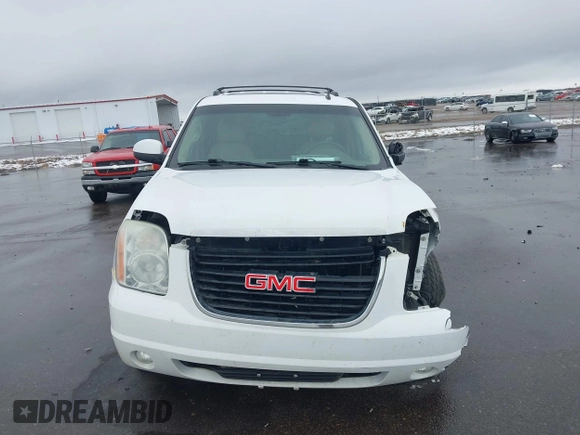 2011 GMC Yukon SLT with VIN 1GKS2CE03BR118690, listed as a IAAI auction lot 41941840 with 243,311 mi miles and . Bid and sale history available at DreamBid. Image 12.