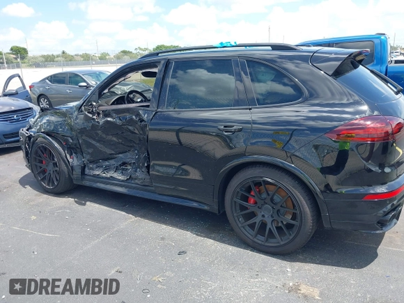 2016 Porsche Cayenne GTS z VIN WP1AD2A25GLA70430, wystawiony jako IAAI lot #42547008 z przebiegiem 108 374 mil mil oraz . Historia ofert i sprzedaży dostępna na DreamBid. Obrazek 14.