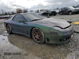 1992 Mitsubishi 3000GT z VIN JA3XE74C2NY028905, wystawiony jako Copart lot #81549834 z przebiegiem 131 349 mil mil oraz Szkody całkowita. Historia ofert i sprzedaży dostępna na DreamBid. Obrazek 4.