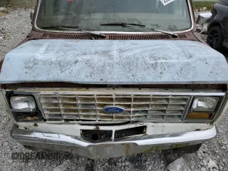 1990 Ford Econoline Wagon XL z VIN 1FBJS31H0LHB33372, wystawiony jako Copart lot #82614224 z przebiegiem Nie podano mil oraz Nie do naprawy • Non repairable. Historia ofert i sprzedaży dostępna na DreamBid. Obrazek 12.