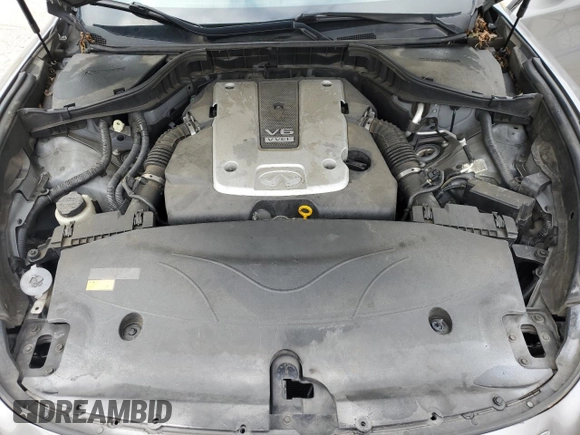 2013 Infiniti M with VIN JN1BY1AR2DM601965, listed as a Copart auction lot 62014215 with 134,047 mi miles and Salvage title. Bid and sale history available at DreamBid. Image 11.