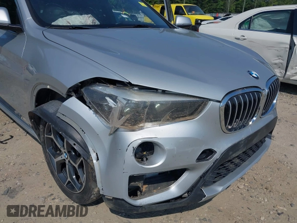 2018 BMW X1 xDrive28i with VIN WBXHT3C39J5L27926, listed as a IAAI auction lot 42582330 with 101,197 mi miles and . Bid and sale history available at DreamBid. Image 6.