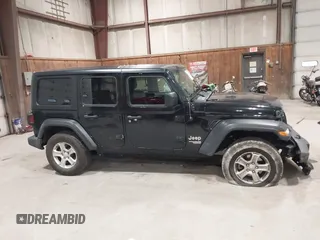 2019 Jeep Wrangler Unlimited Sport Altitude with VIN 1C4HJXDGXKW505396, listed as a IAAI auction lot 42039985 with 146,178 mi miles and . Bid and sale history available at DreamBid. Image 13.