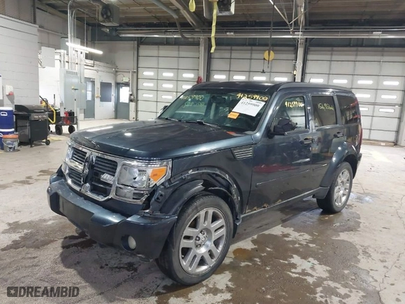 2008 Dodge Nitro SLT with VIN 1D8GU58K68W223532, listed as a IAAI auction lot 41259900 with 156,956 mi miles. Bid and sale history available at carsss.com. Image 6.